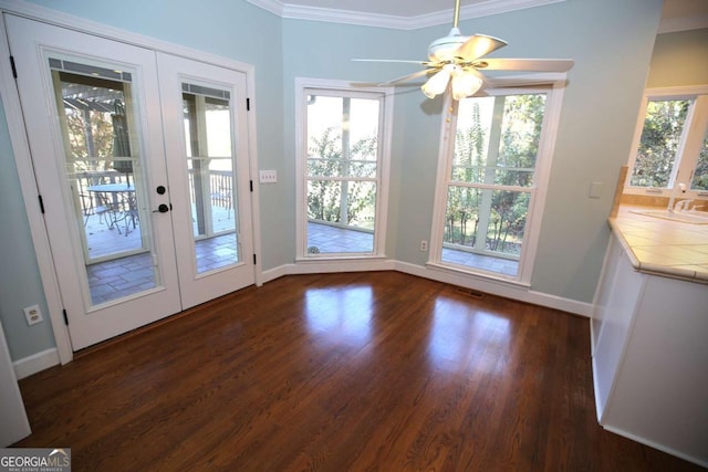 doorway to outside with sink, dark hardwood / wood-style flooring, ornamental molding, ceiling fan, and french doors