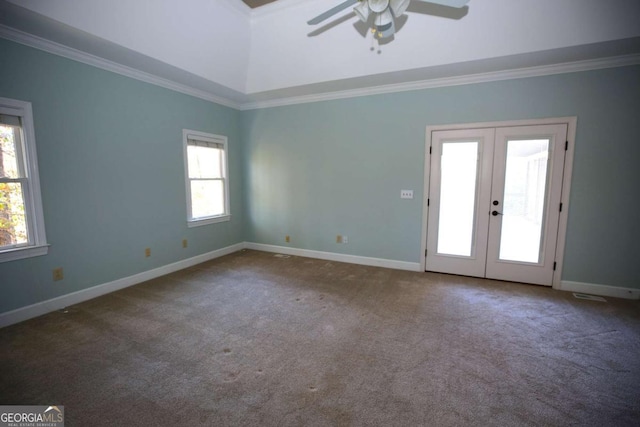 unfurnished room featuring crown molding, carpet floors, ceiling fan, and french doors