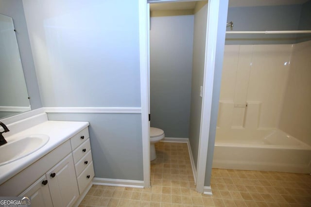 full bathroom with vanity, shower / washtub combination, and toilet