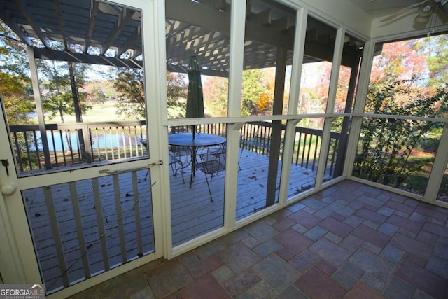 unfurnished sunroom featuring a wealth of natural light