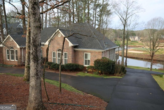 view of front of home featuring a water view