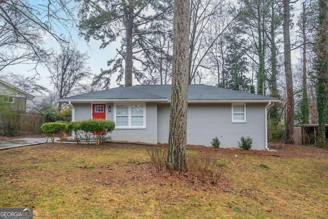 view of property exterior with a yard