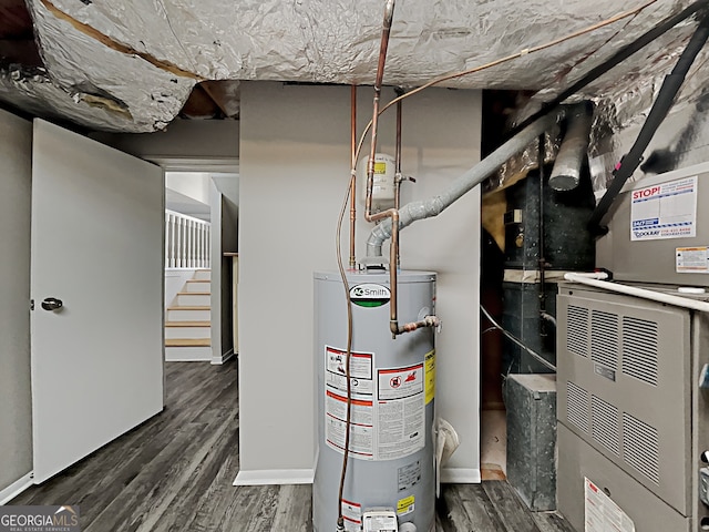 utility room featuring gas water heater