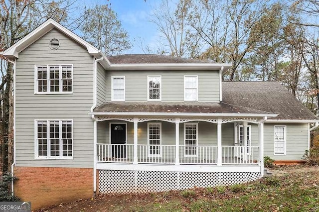 145 Price Hills Ct, Sugar Hill, GA 30518 - view of front of property featuring a porch, brick siding, and a shingled roof