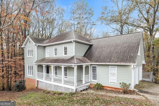145 Price Hills Ct, Sugar Hill, GA 30518 - view of front of house featuring covered porch and roof with shingles
