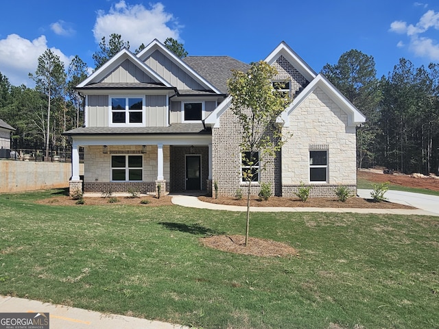 craftsman-style house featuring a front yard and a porch