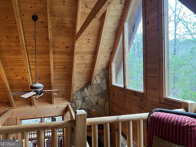 room details with wood ceiling, beam ceiling, and wood walls