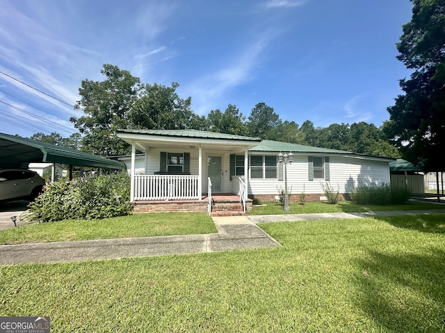 view of front of house featuring a front yard and a porch