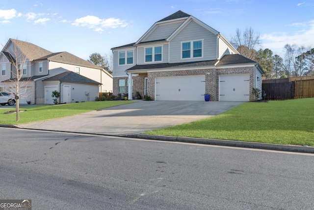 view of front of home featuring a garage and a front lawn