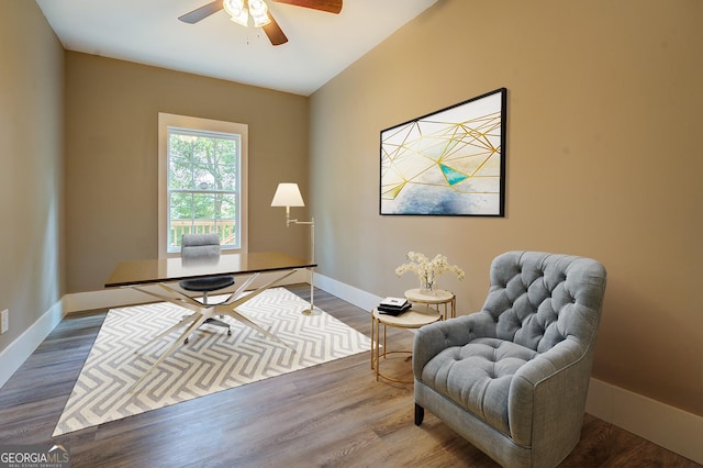 office with hardwood / wood-style flooring and ceiling fan