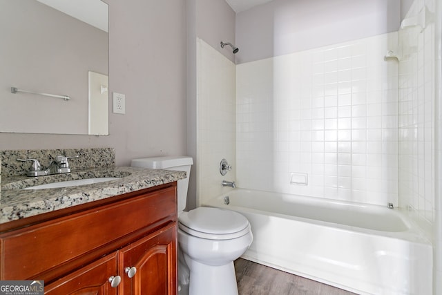 5876 Old Wellborn Trce, Lithonia, GA 30058 - bathroom featuring shower / bath combination, vanity, and wood finished floors