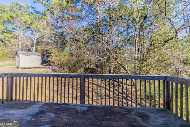 5876 Old Wellborn Trce, Lithonia, GA 30058 - wooden deck with a storage shed