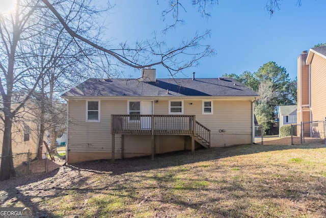 5876 Old Wellborn Trce, Lithonia, GA 30058 - back of property featuring a wooden deck, a chimney, and stairs