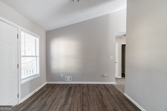 5876 Old Wellborn Trce, Lithonia, GA 30058 - unfurnished room with dark wood finished floors and healthy amount of natural light