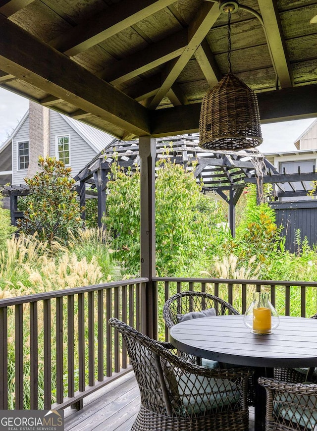 deck with outdoor dining space