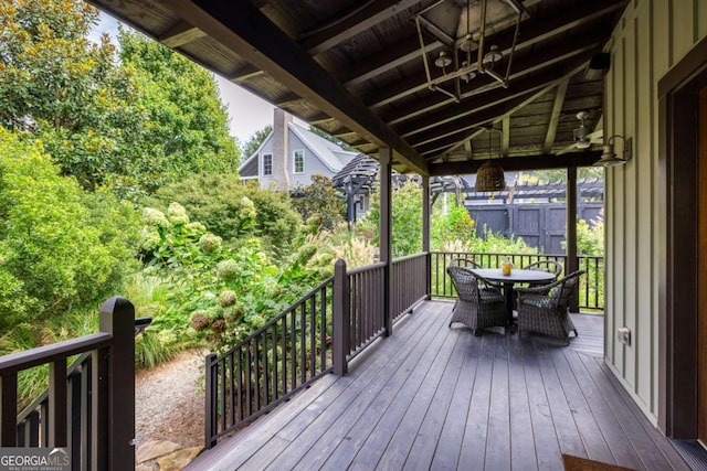 wooden deck with outdoor dining space