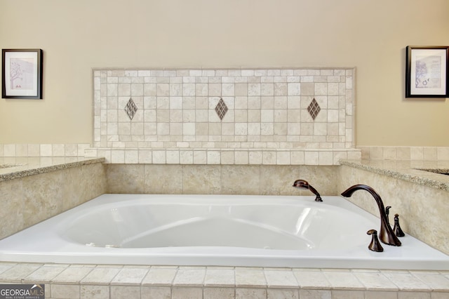 bathroom featuring a relaxing tiled tub