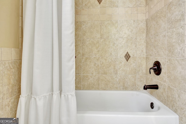 bathroom featuring shower / bath combo