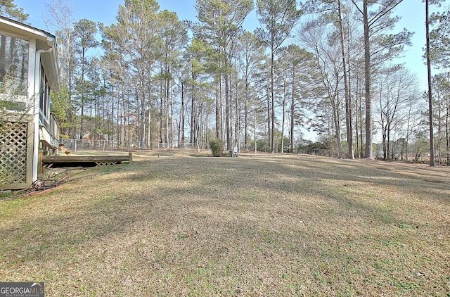 view of yard featuring a deck