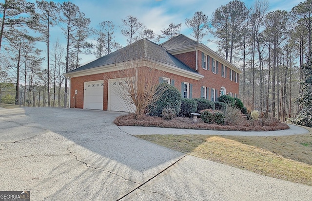 view of side of property featuring a garage