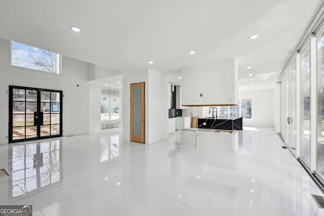 interior space featuring plenty of natural light and french doors