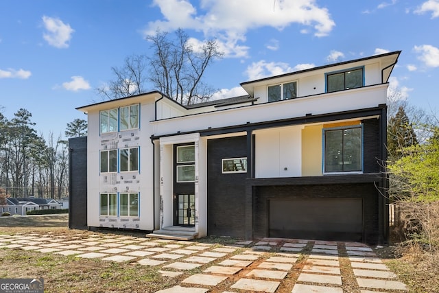 contemporary home featuring a garage