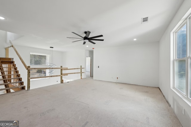 unfurnished room with ceiling fan