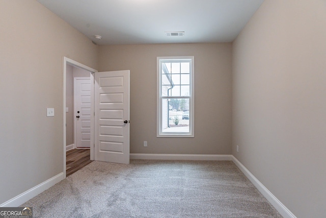 view of carpeted spare room