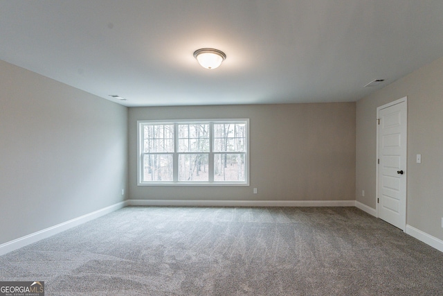 view of carpeted spare room