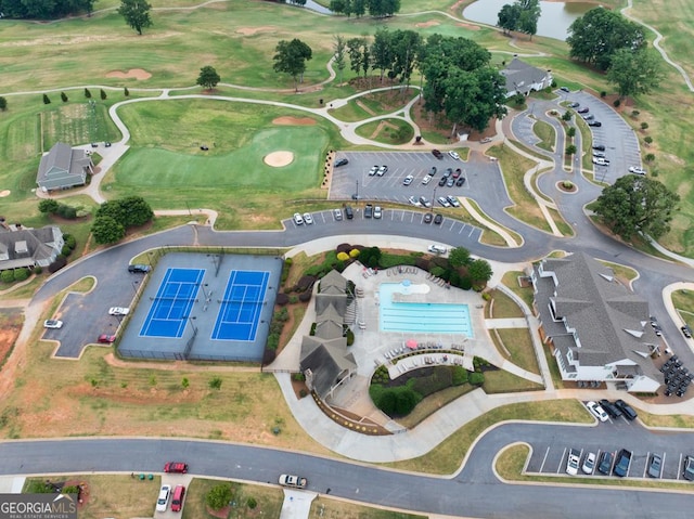 bird's eye view with view of golf course
