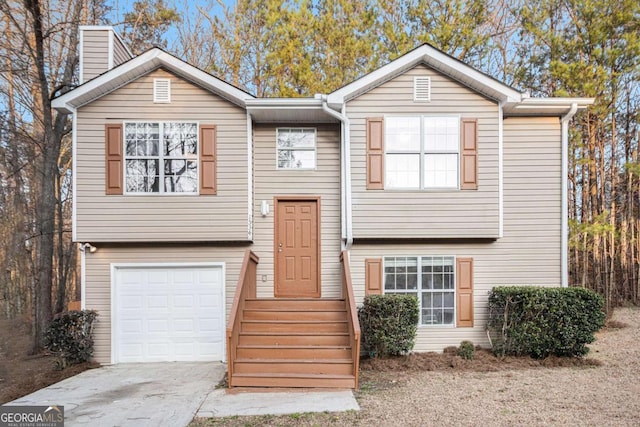 bi-level home with a garage