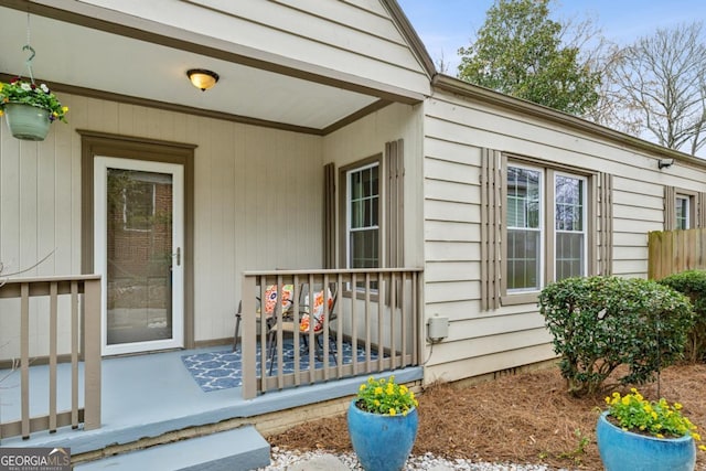 entrance to property with covered porch