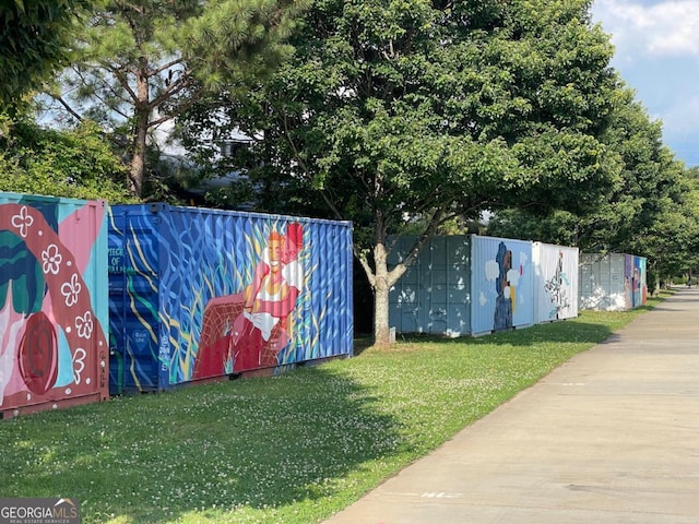 view of outdoor structure featuring a yard