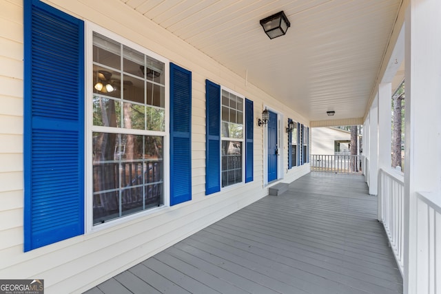 wooden terrace featuring a porch