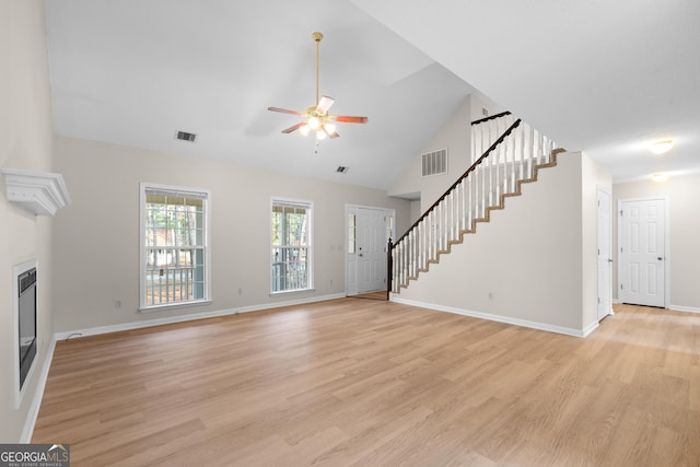 unfurnished living room featuring ceiling fan, high vaulted ceiling, and light hardwood / wood-style floors