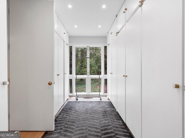 doorway to outside featuring recessed lighting