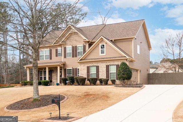 craftsman-style home with a garage