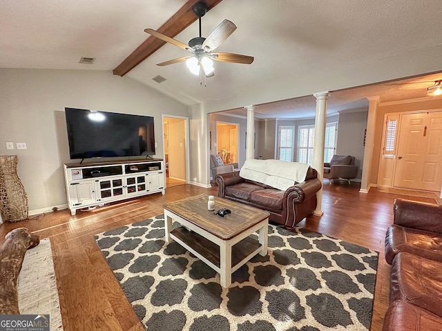 living room with vaulted ceiling with beams, dark wood-type flooring, decorative columns, and ceiling fan