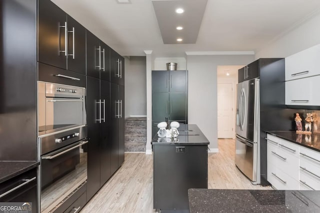 kitchen featuring a kitchen island, white cabinetry, crown molding, light hardwood / wood-style floors, and stainless steel refrigerator with ice dispenser