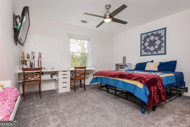 bedroom with ceiling fan and carpet