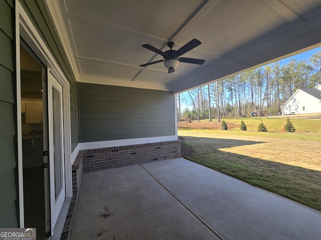 view of patio / terrace featuring ceiling fan