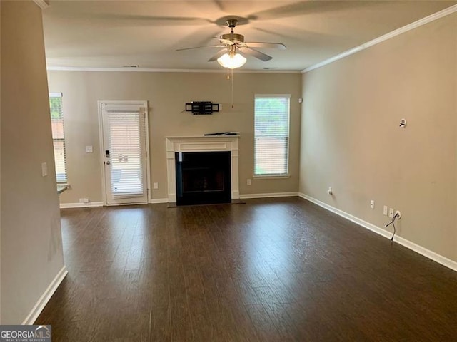 unfurnished living room with ornamental molding, dark wood-type flooring, and ceiling fan