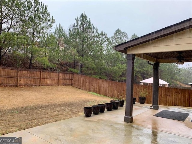 view of patio with ceiling fan