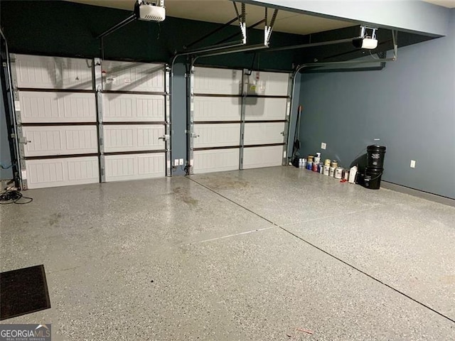 garage featuring a garage door opener