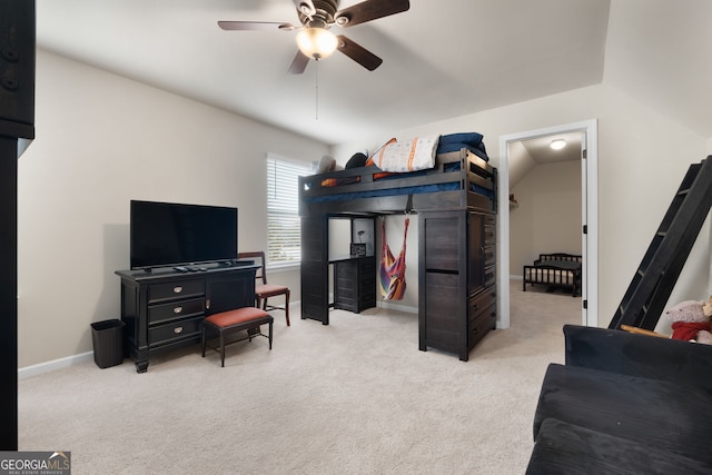 bedroom featuring ceiling fan and light carpet