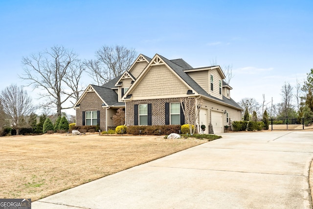 view of front of home with a garage and a front yard