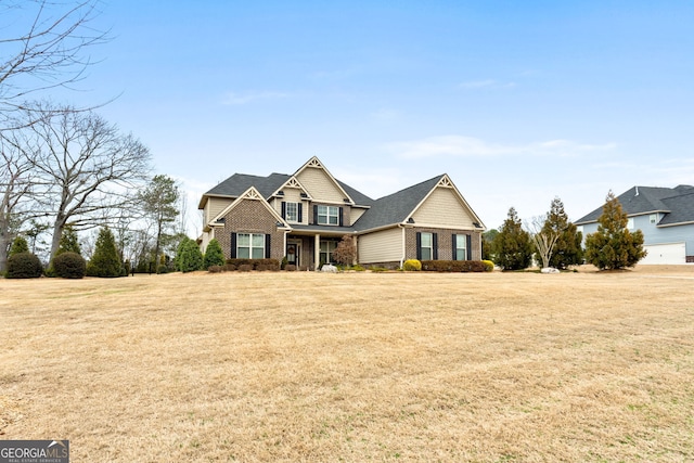 view of front of property featuring a front yard