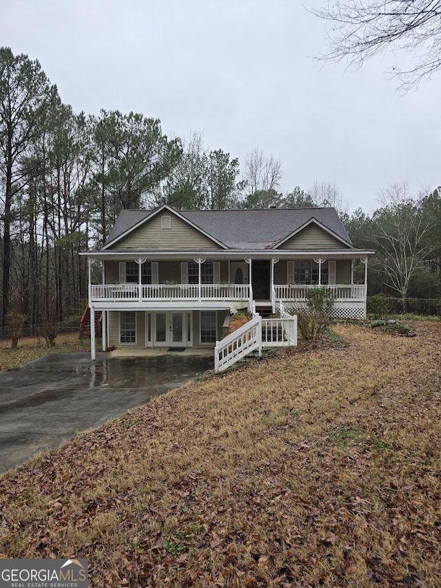 farmhouse inspired home with a porch