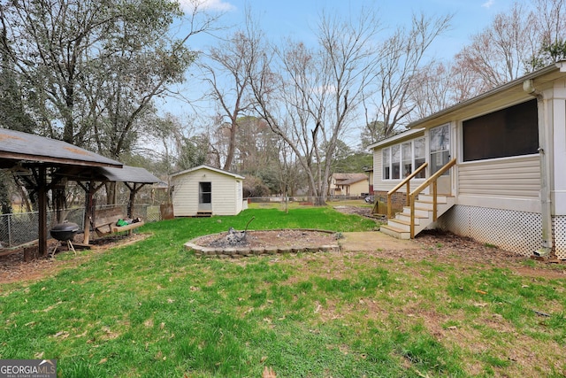 view of yard with a storage unit