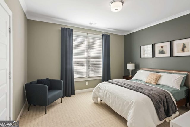 carpeted bedroom with ornamental molding